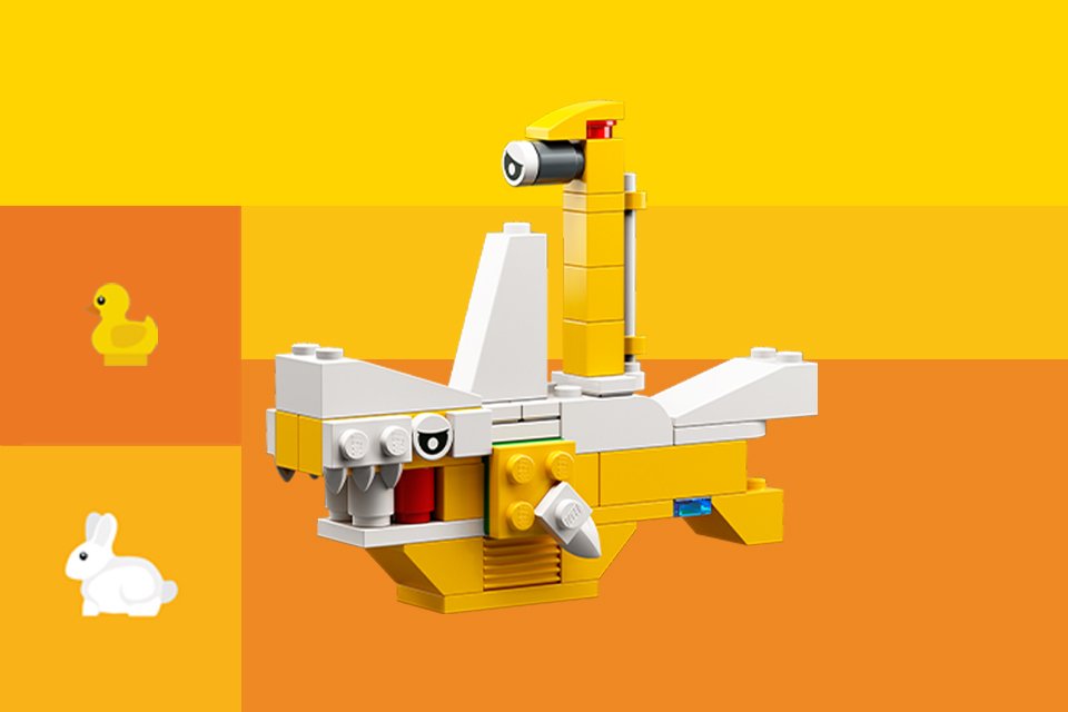 A LEGO® shark build against yellow background.